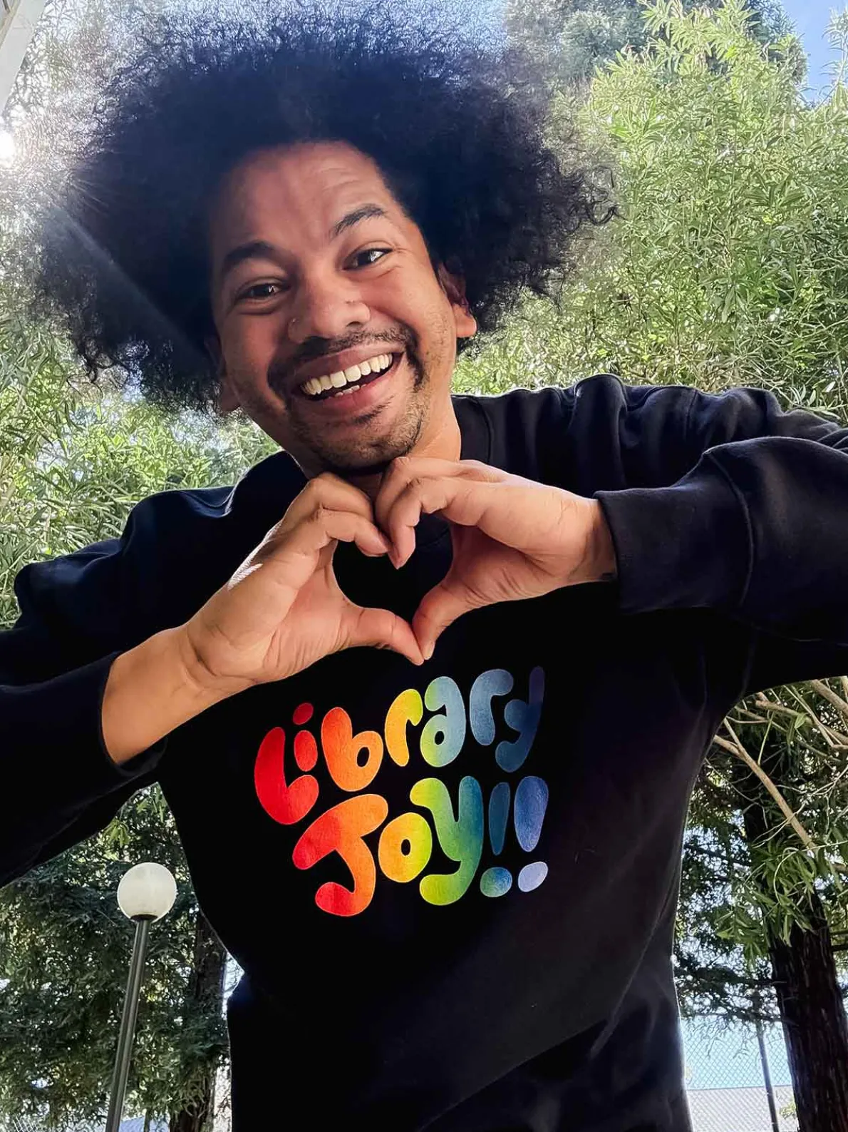 Mychal Threets: Library Joy Unisex Sweatshirt (Print Shop)